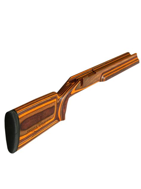 The large, straight comb buttstock was designed with the bottom running at a three degree slant to allow it to move down and away from the face under heavy recoil. . Protektor benchrest stock